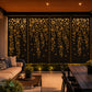 Garden Falls 4 panel floral laser cut privacy screen installed in a modern Australian pergola with warm evening lighting